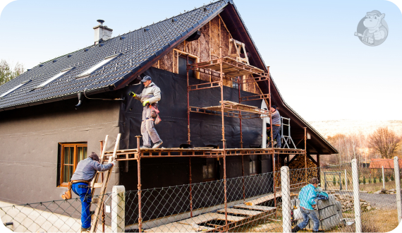 ekipa wykonująca termoizolację ścian zewnętrznych domu